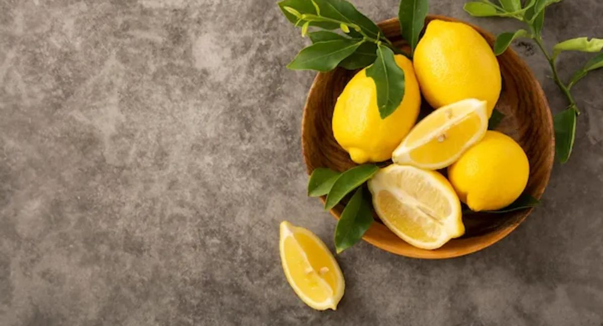 Fresh lemons and lemon water with measuring tape, illustrating weight loss benefits, myths, science, and healthy lifestyle habits.